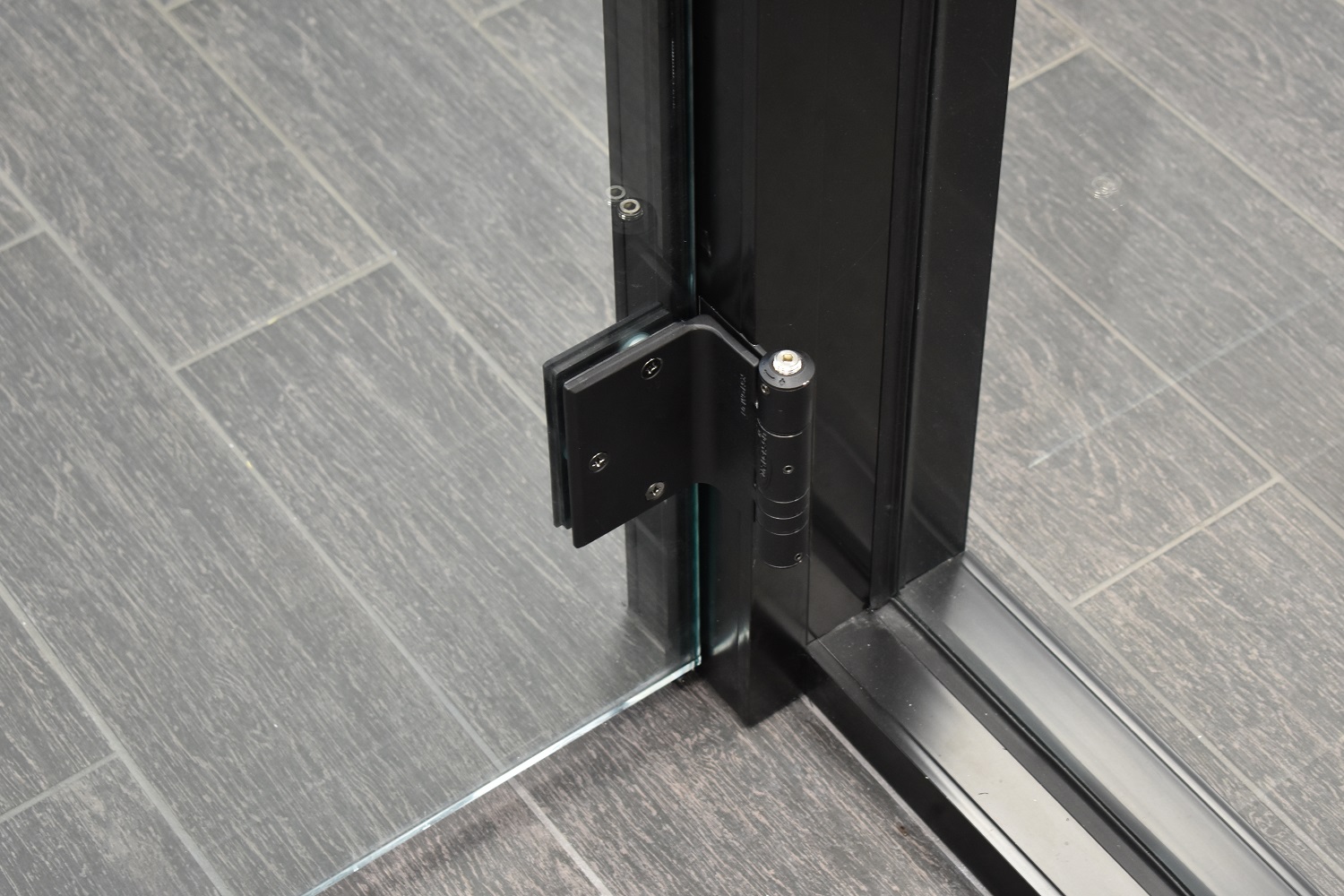 Glass door hinge detail